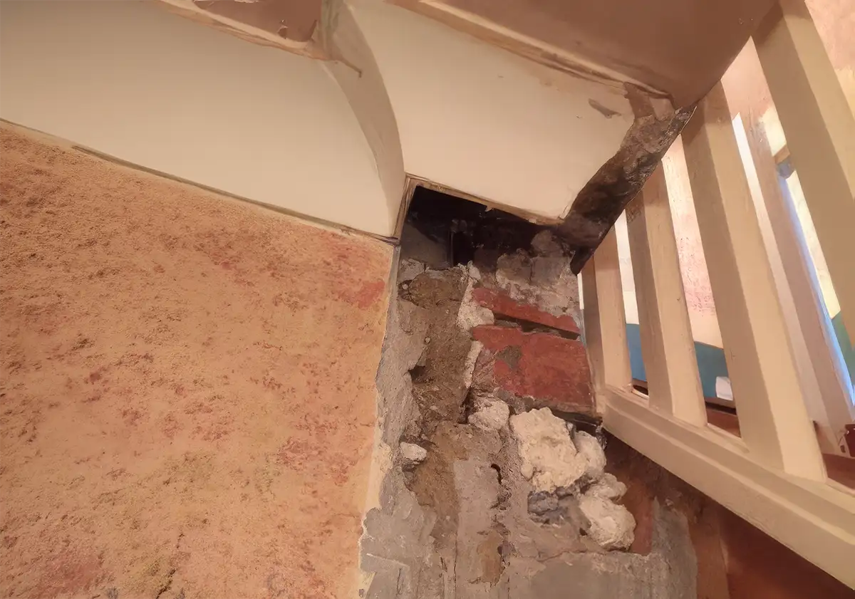 After: freshly plastered room with smooth finish